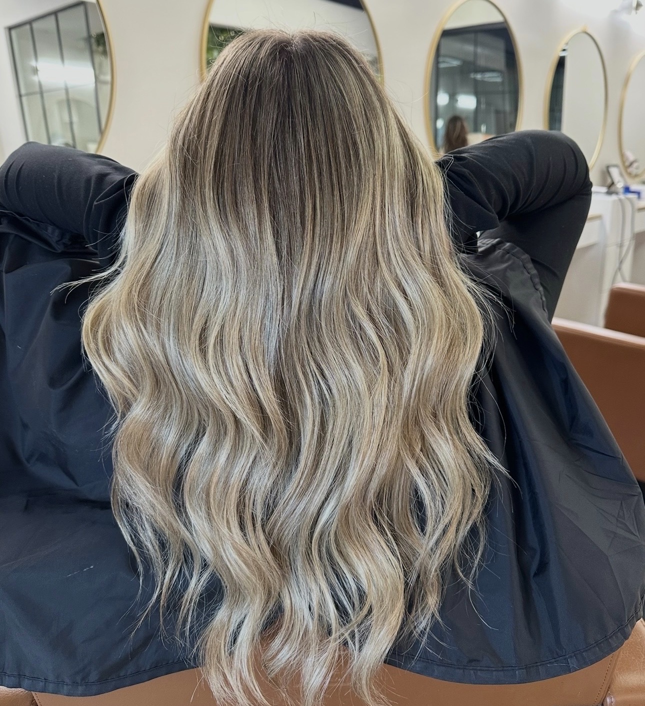 Dimensional lived-in blonde by Ana at AMAVI Salon